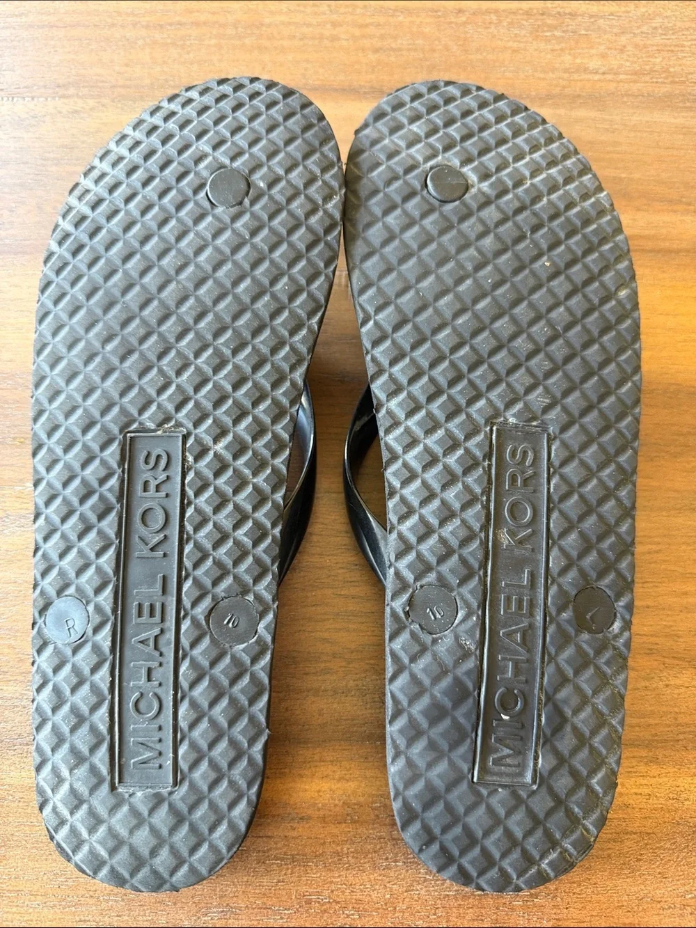Michael Kors Black and Gold MK Logo Jelly Flip Flop Sandals